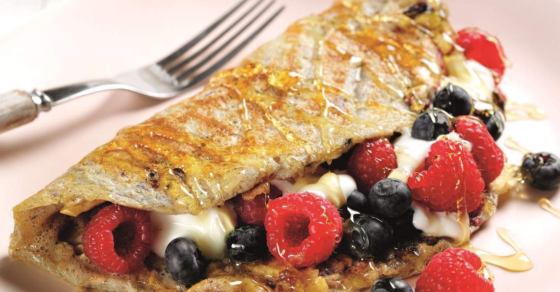 Muesli and berry egg wrap